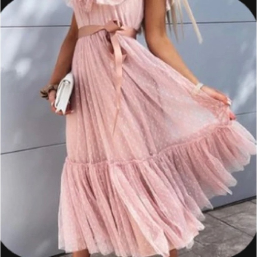Polkadot pink dress.